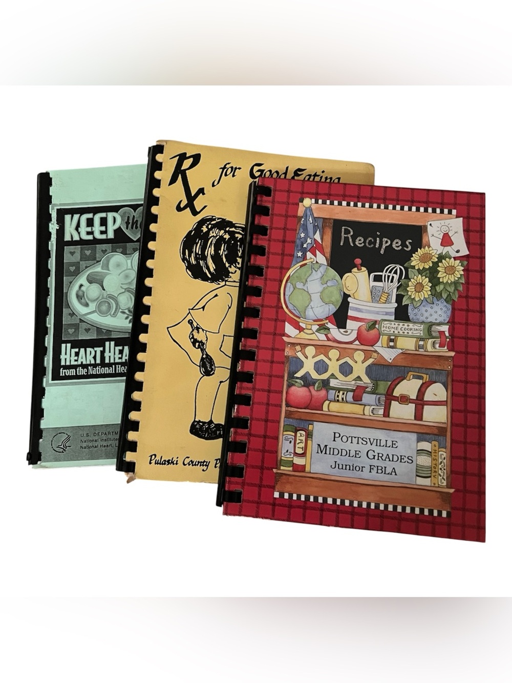 Local spiral-bound cookbooks from teachers and other organizations